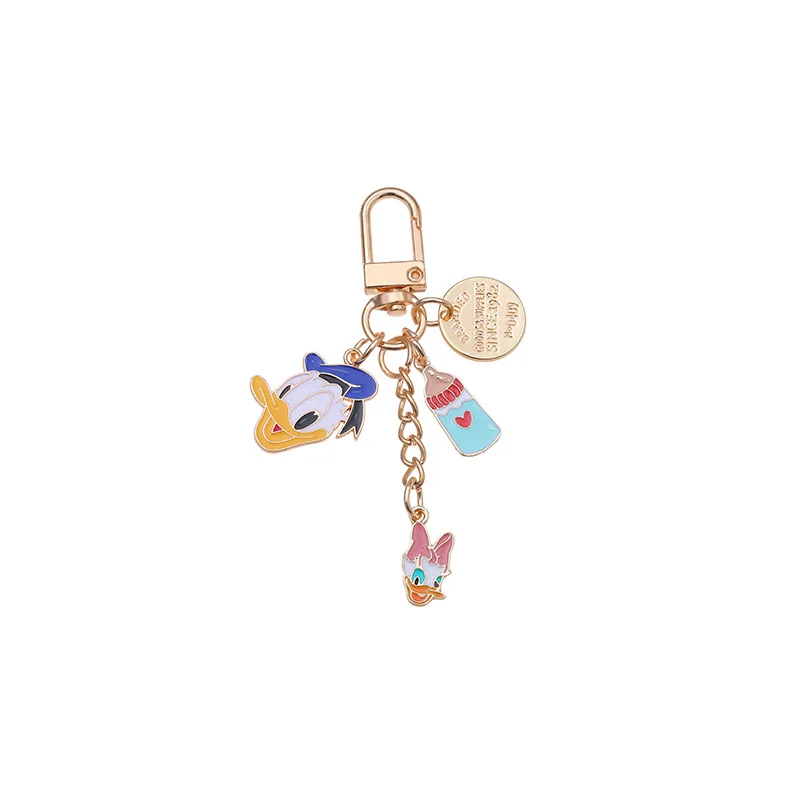 

Disney Donald Duck Keychain Cute Daisy Cartoon Enamel Metal Keyring Personality Couple Airpods Earphone Pendant Car Key Chain