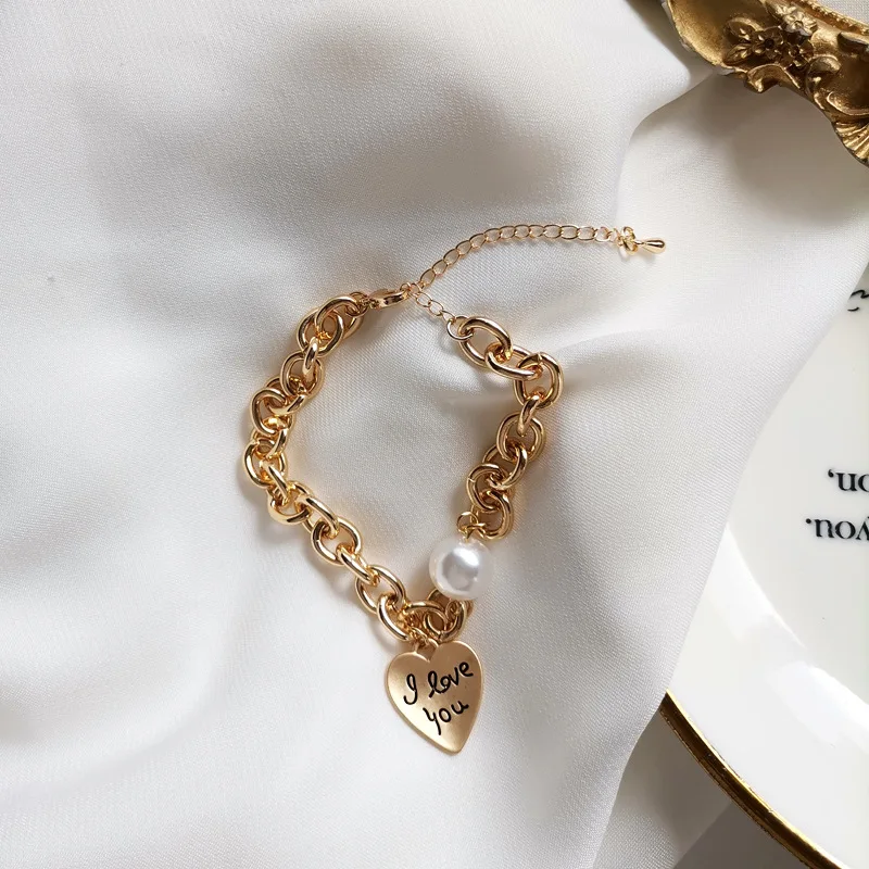 

Fashion punk wind heart-shaped letters pearl hand catenary creative personality