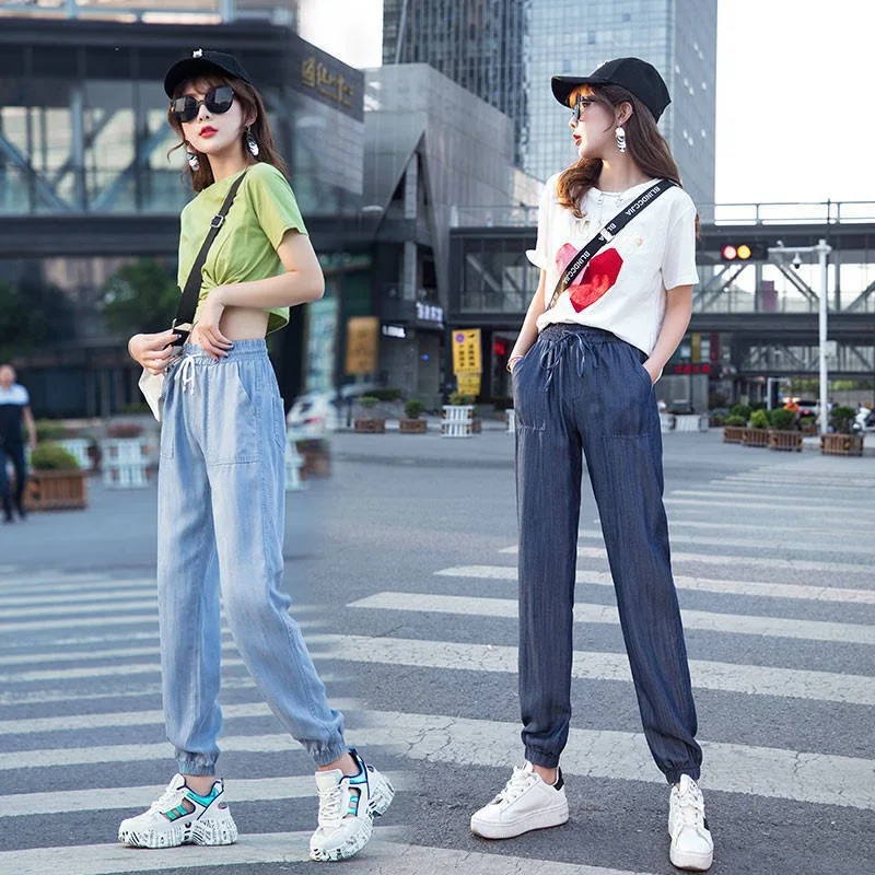 

Ladies pants summer thin section tencel nine-point pants female Korean version of jeans loose and thin ice silk harem pants all-