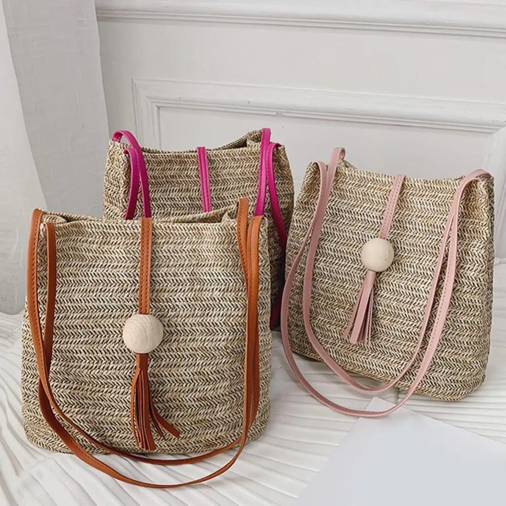 

Casual Woven One-shoulder Straw Bag New Wild Bucket Bag Portable Female Weave Handbag Wooden Ball Tassel Tote Bags