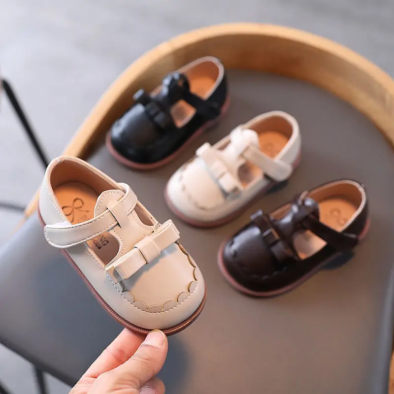 Детские кожаные туфли демисезонные кроссовки для маленьких принцесс с бантом