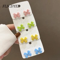 flscdyed acrylic candy color bow knot cute girls stud earrings 2021 fashion circle twist earring for women party jewelry gift
