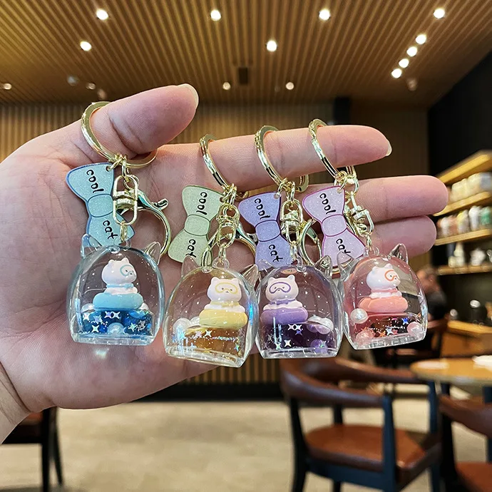 

Floating Cat Acrylic Creative Decompression Cute Keychain Pendant Female Quicksand Bag Pendant Key Chain Wholesale