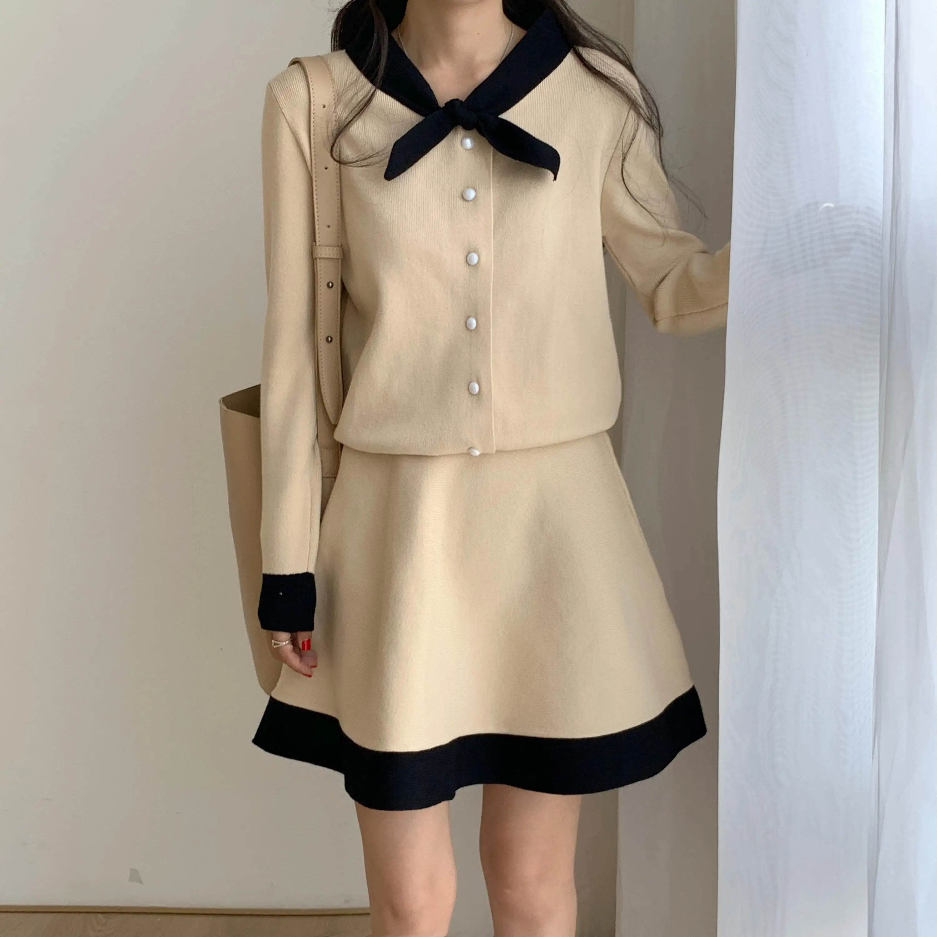 

Zcwxm Elegant Two Piece Skirt Set Women V-neck Knit Bow Suit + High Waist Skirt Shorts Set A-line Autumn And Winter Knee-length