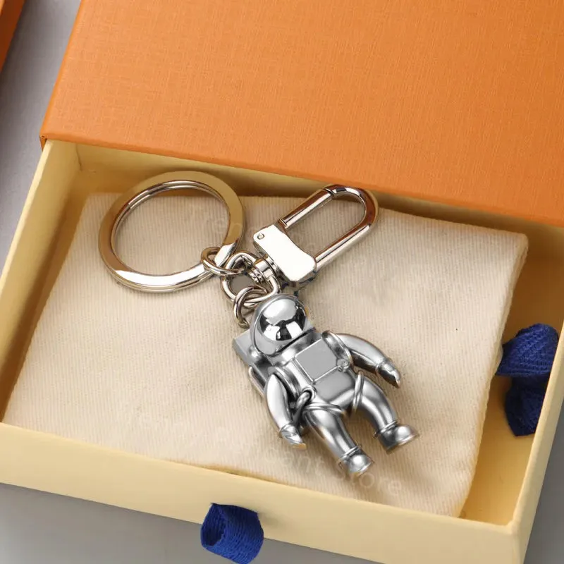 

Hot Sale High Version Luxury Brand Metal Astronaut Keychain High Quality Luxury Letter Spaceman Car Keyring Pendant Couple Gift