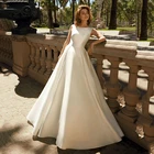 Современное атласное свадебное платье с открытой спиной и круглым вырезом