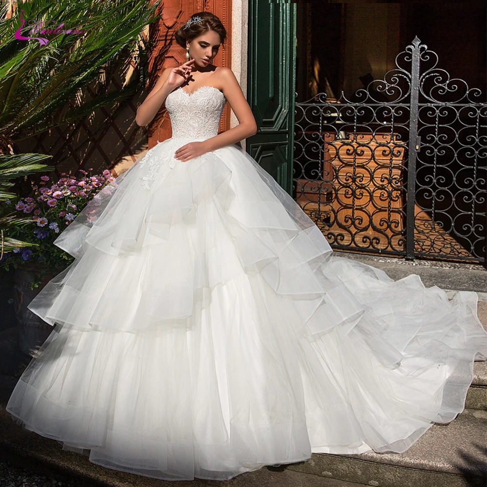 

Waulizane Strapless Ball Gown Wedding Dress Ruffle Puffy Skirt Of Lace Up Back Bridal Dress