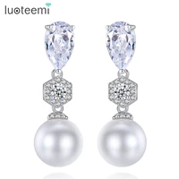 luoteemi fashion shell pearl dangle drop earrings with cz crystal for women charming wedding jewelry for bridals wholesale