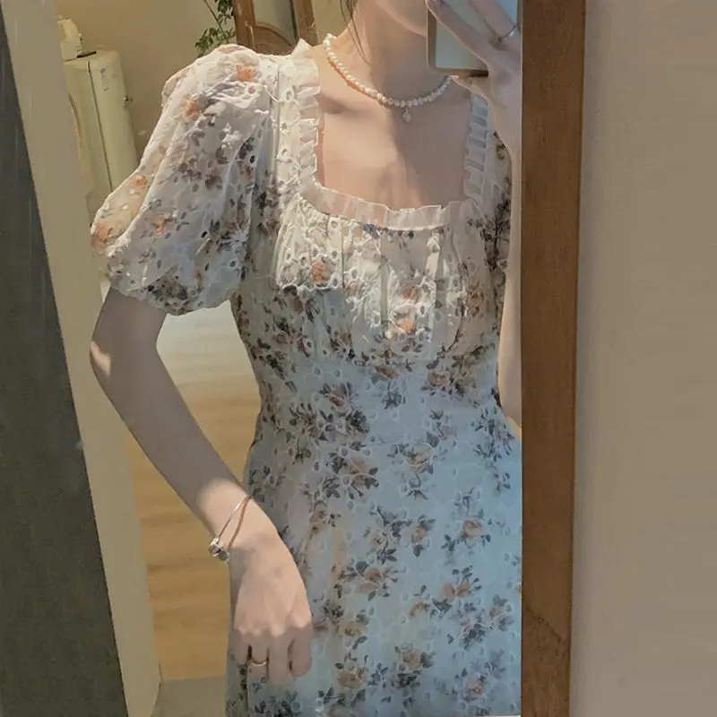

Hstar Casual Puff Sleeve Party Dresses 2021 Summer Vintage Floral Dress Women Sweet French Retro Lace Up Elegant Midi Dress