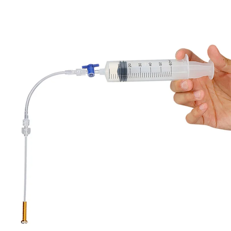 

MTB Bicycle Bike Tubeless Sealant Injector with Multifunctional Valve Cap Valve Core Tool for Mountain Road Bike Tubeless Tire