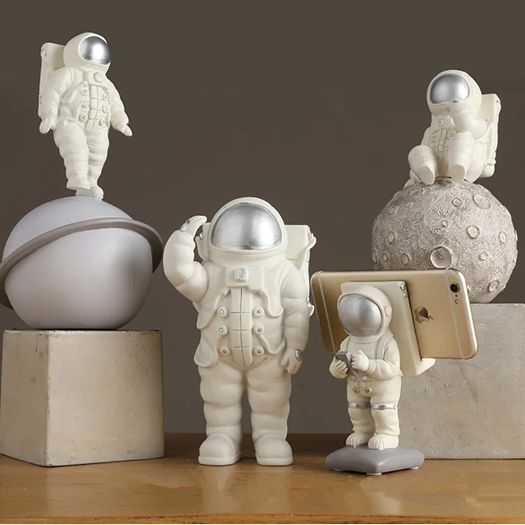 

astronaut mobile phone rack model resin living room decoration small items
