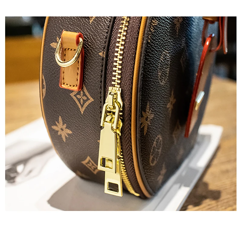 

2021 new fashion luxury leather all-match small round bag European and American style one-shoulder messenger portable small bag