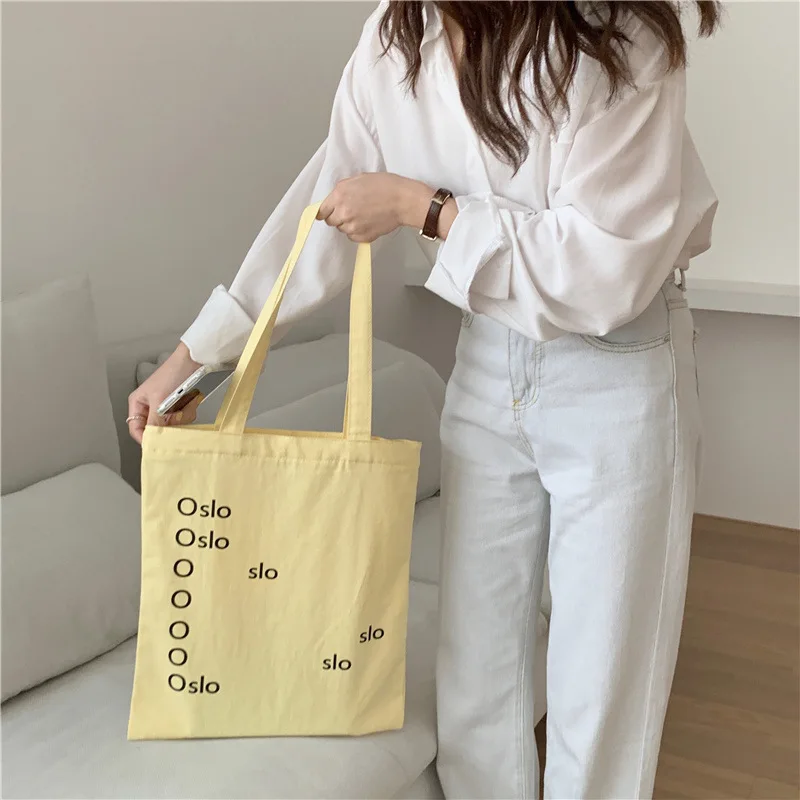 

Women's Large Capacity Light Yellow Shopper Bags Student Girls Daily Book Tote Handbags Ladies Simple Letter Canvas Shoulder Bag
