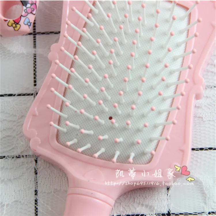 

Lovely cartoon KT cat comb wholesale air bag negative ion hairdressing comb pink girl long hair comb