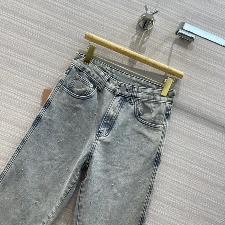 Spring/summer 2021 women's new temperament commute casual water drill decoration grinding edge straightened jeans