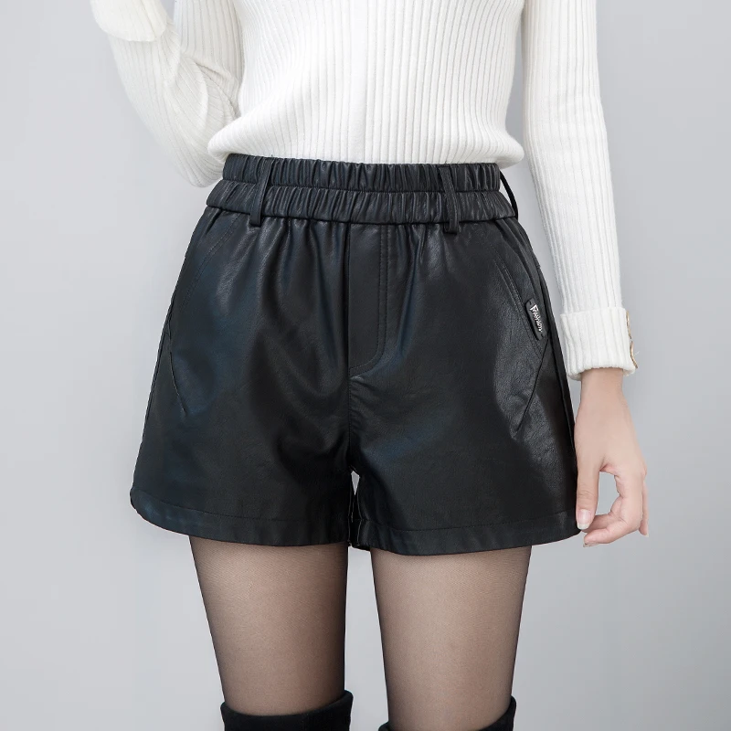 

Новые повседневные и универсальные стильные осенне-зимние шорты из искусственной кожи с тонкой и свободной талией для женщин, широкие шорт...