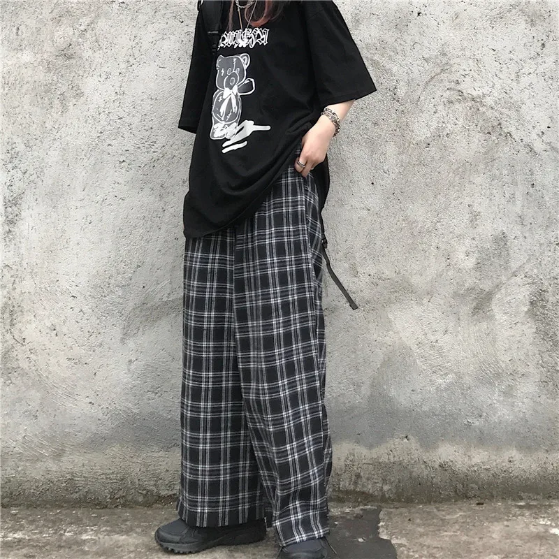Женские длинные брюки свободного покроя черно-белые клетчатые с эластичным