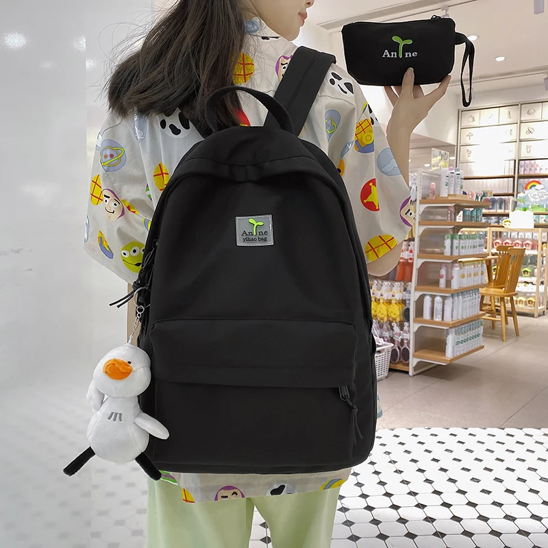 

Нейлоновый школьный ранец HOCODO для женщин, модный однотонный водонепроницаемый рюкзак, многофункциональная Дорожная сумка на двойной молни...