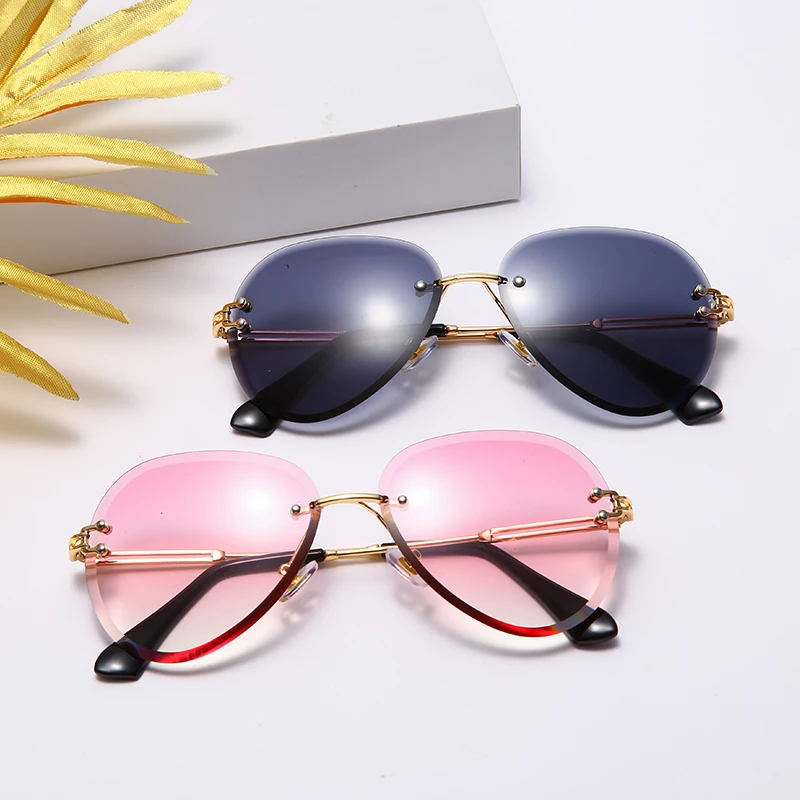 

Fashion Rimless Sunglasses Women Metal Sun glasses Luxury Lady Shades UV400 Eyewear Oculos Lunette De Soleil Femme