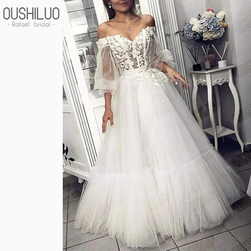 Прозрачное свадебное платье с длинным рукавом открытыми плечами корсет