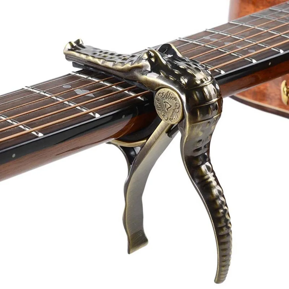 

Alice Guitar Capo Trigger Crete Metal Clamps Crocodile Head For Acoustic Electric Classical Guitar Ukulele Banjo Capo Clamp Key