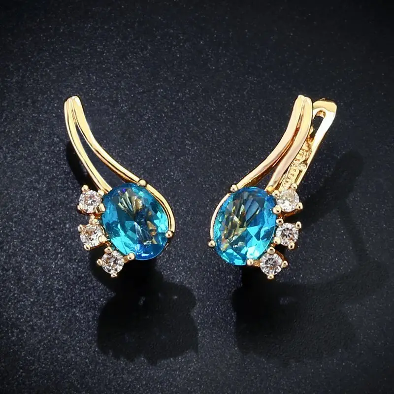 Серьги-гвоздики 585 розовое золото голубые циркониевые праздничные подарки