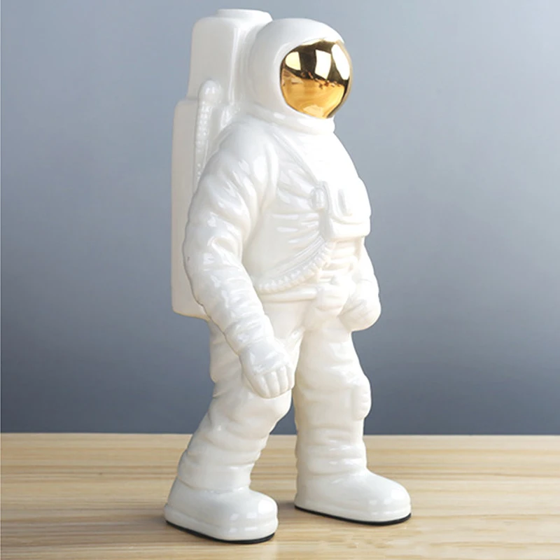 

Space Man Astronaut Sculpture Rocket Plane Pattern of Ceramic Material Cosmonaut Statue Fashion Decorations