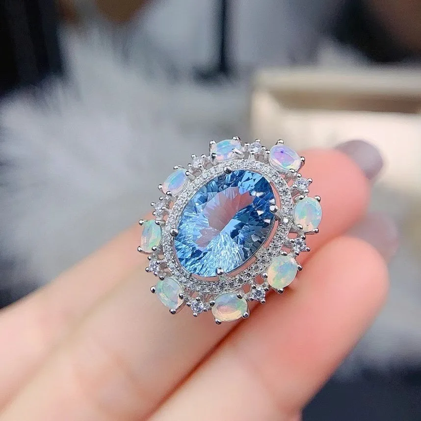 Кольцо из серебра 100% пробы с натуральным голубым топазом опалом