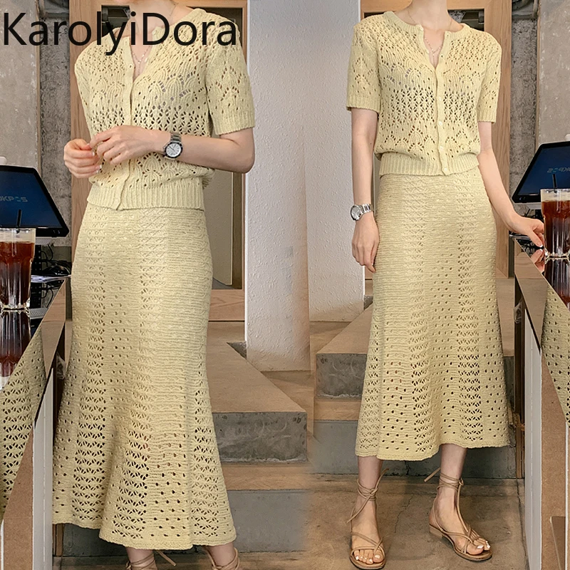 

2020 elegant summer knitted 2 piece set hollow out knit top cardigans high waist long skirt suit runway women's set