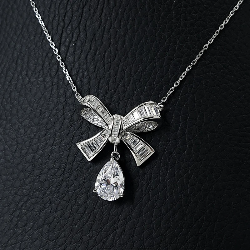 

Knobspin 100% 925 Sterling Silver Bowknot Wedding Pendant Necklace For Women 7*10mm High Carbon Diamond Fine Jewelry Wholesale