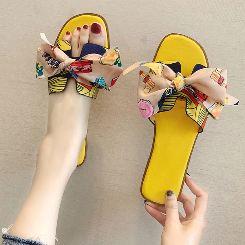 

2021Summer FashionColor Ribbon Bow Flat Heel Flat Slippers Women's Outer Wear Floral Women's Shoes Indoor andOutdoor Beach Shoes