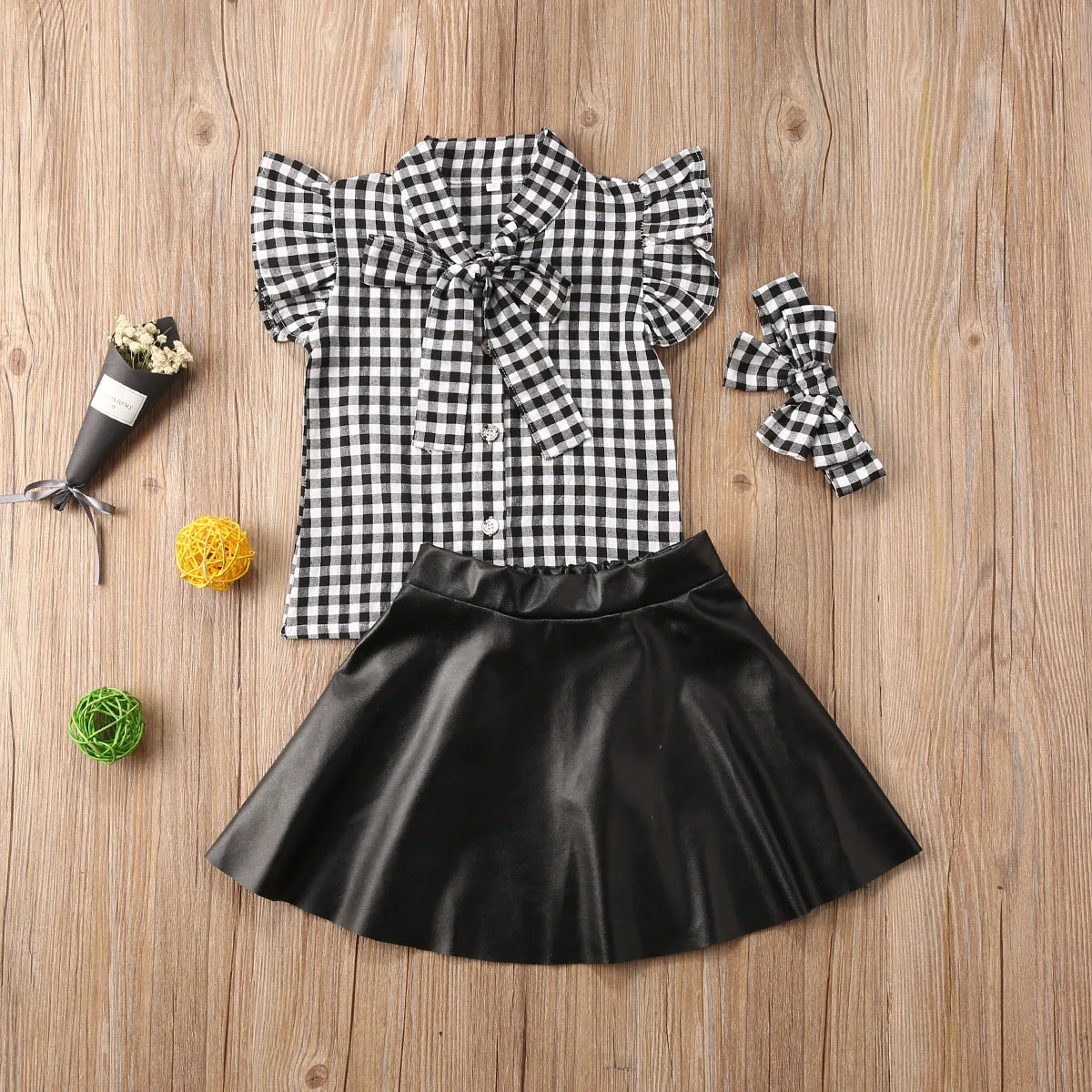 

1-6Y Fashion Infant Baby Girls Clothes Sets Plaid Print Ruffles Sleeve T Shirts Tops+Pu Leather Skirts 2pcs