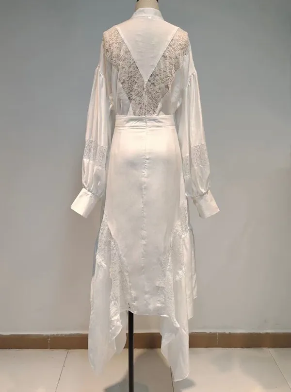 

Spring/summer 2021 Australian beach holiday wind favors the lantern sleeve lace stitching irregular dress dress