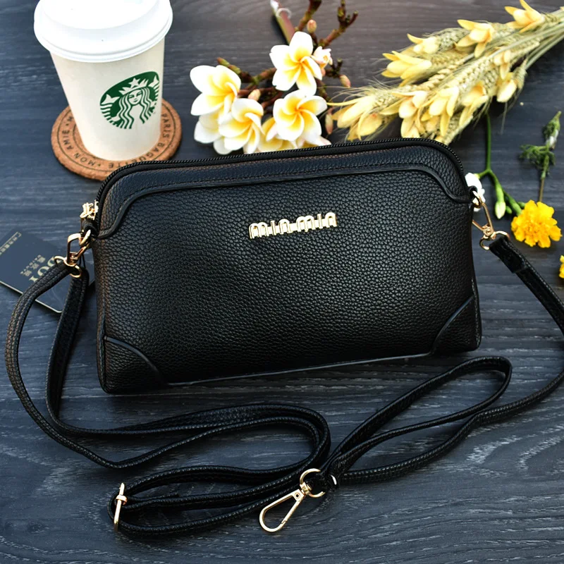 

2020 new casual ladies Messenger bag PU Korean version of the bag big capacity temperament two mobile phone bag