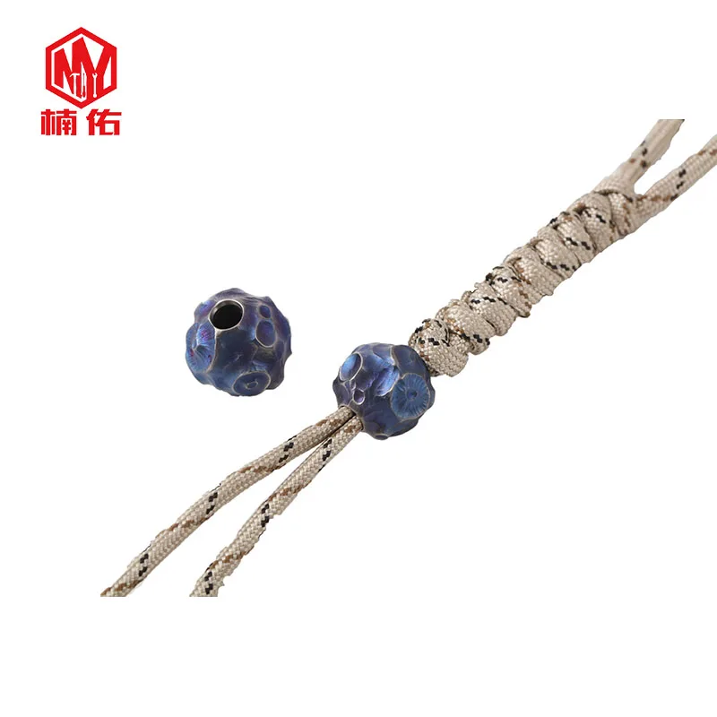 

Handmade Original Titanium Alloy Beads Pure Titanium Umbrella Rope Pendant Knife Beads EDC Outdoor Pocket Tool Crater Surface