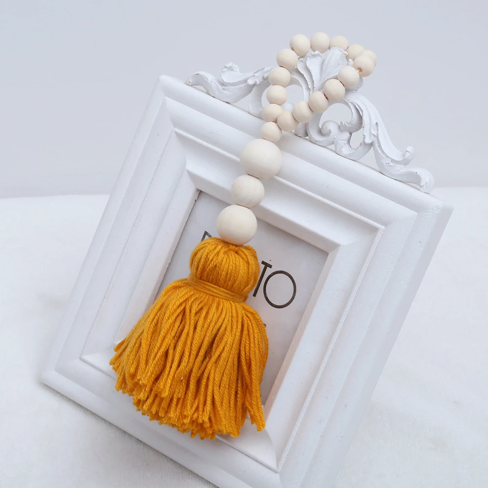 Скандинавские деревянные бусины с кисточками дизайн детской комнаты фото