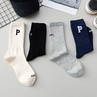 2021 new cotton letter socks men and women the same harajuku style college style sports socks trend mid tube couple socks