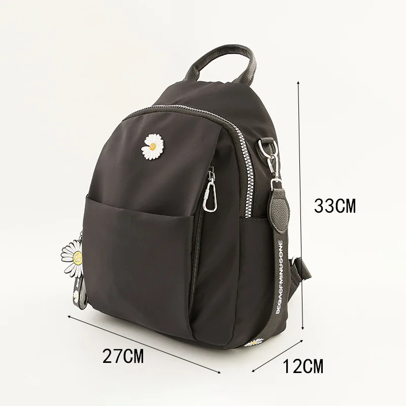 

Composite cloth daisy backpack female student bag male bag new joker leisure travel female backpack