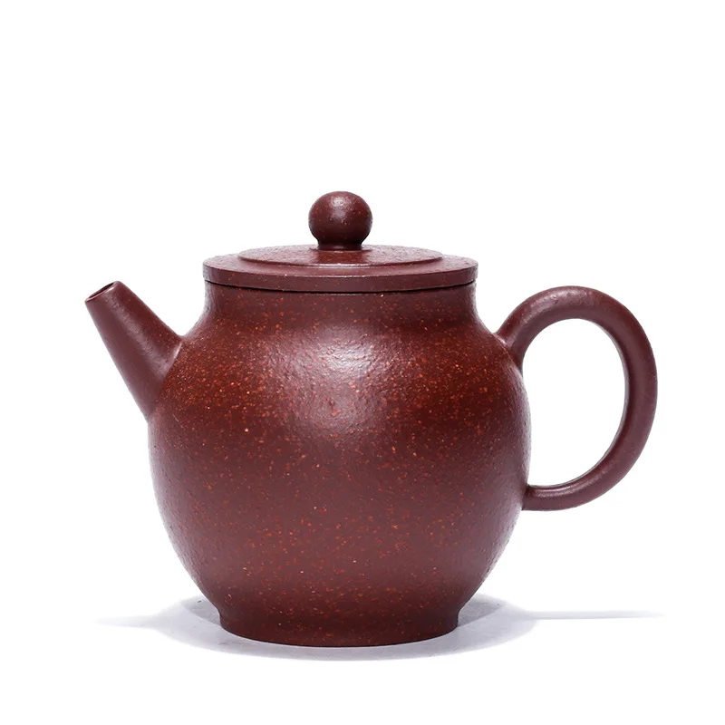 

Yixing teapot is hand carved with gifts from famous artists