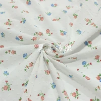 cotton polka dot cut flowers and small floral fabrics for childrens wear and womens clothing fabrics