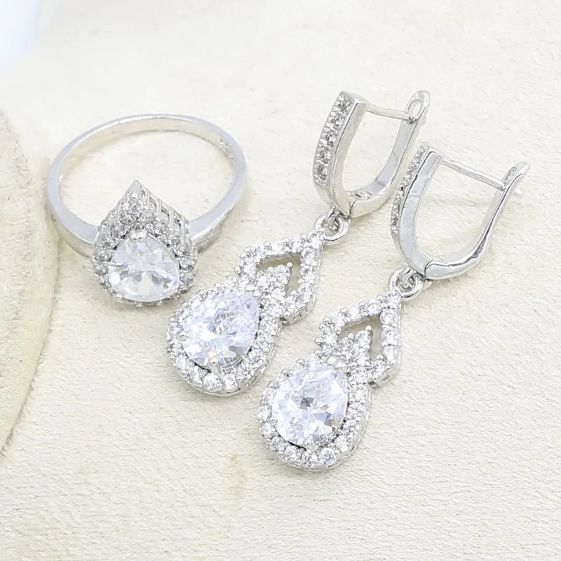 Комплект из кольца и сережек с цирконом серебристого цвета | Украшения