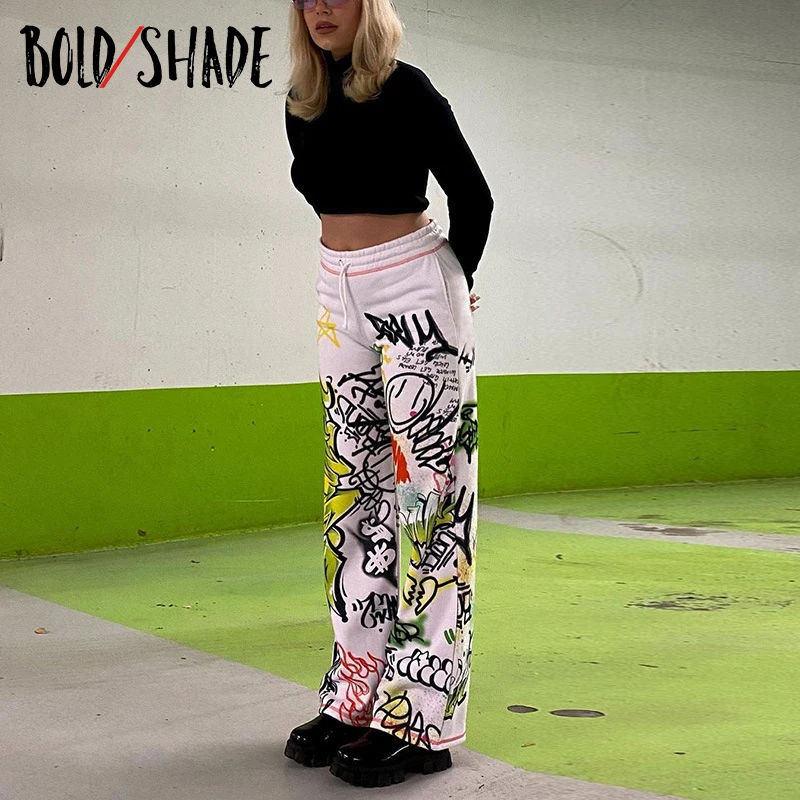

Bold Shade Graffiti Print Skater Sweatpants Elastic Waist Wide Legs Grunge Fashion Loose Pants Streetwear Indie Women Trousers