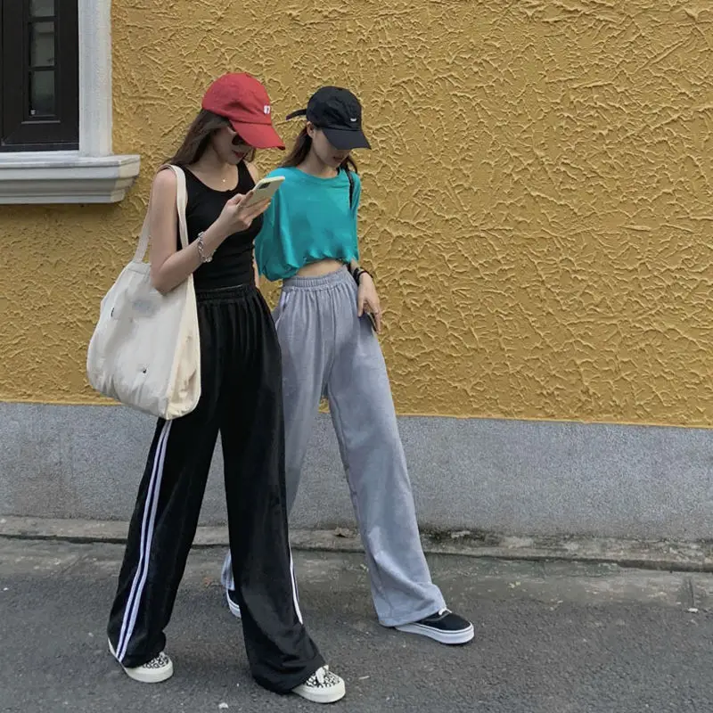 

Черные спортивные брюки для женщин, модные осенние брюки в Корейском стиле с принтом для бега, женские повседневные универсальные брюки с в...