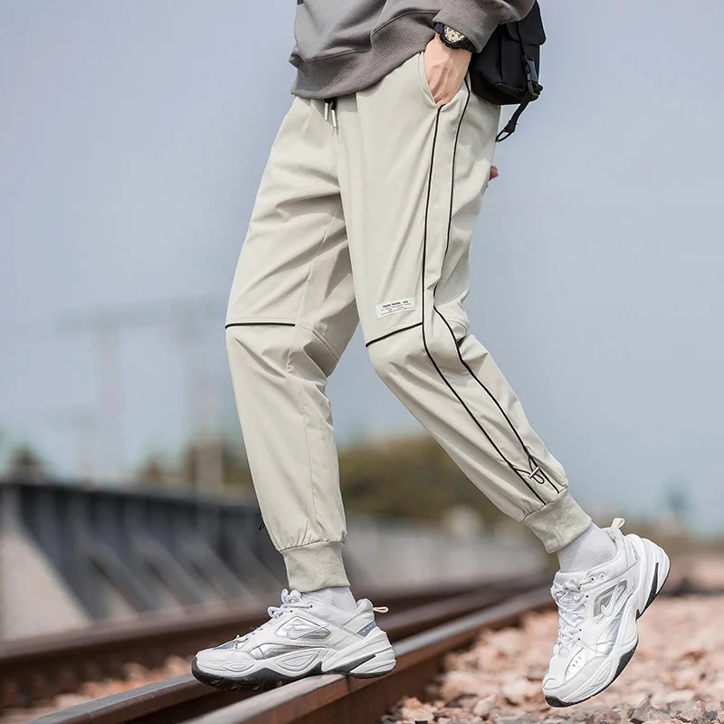 Брюки мужские осенние 2021 новые модные рабочие брюки оптовая продажасвободные спортивные повседневные мужские брюки
