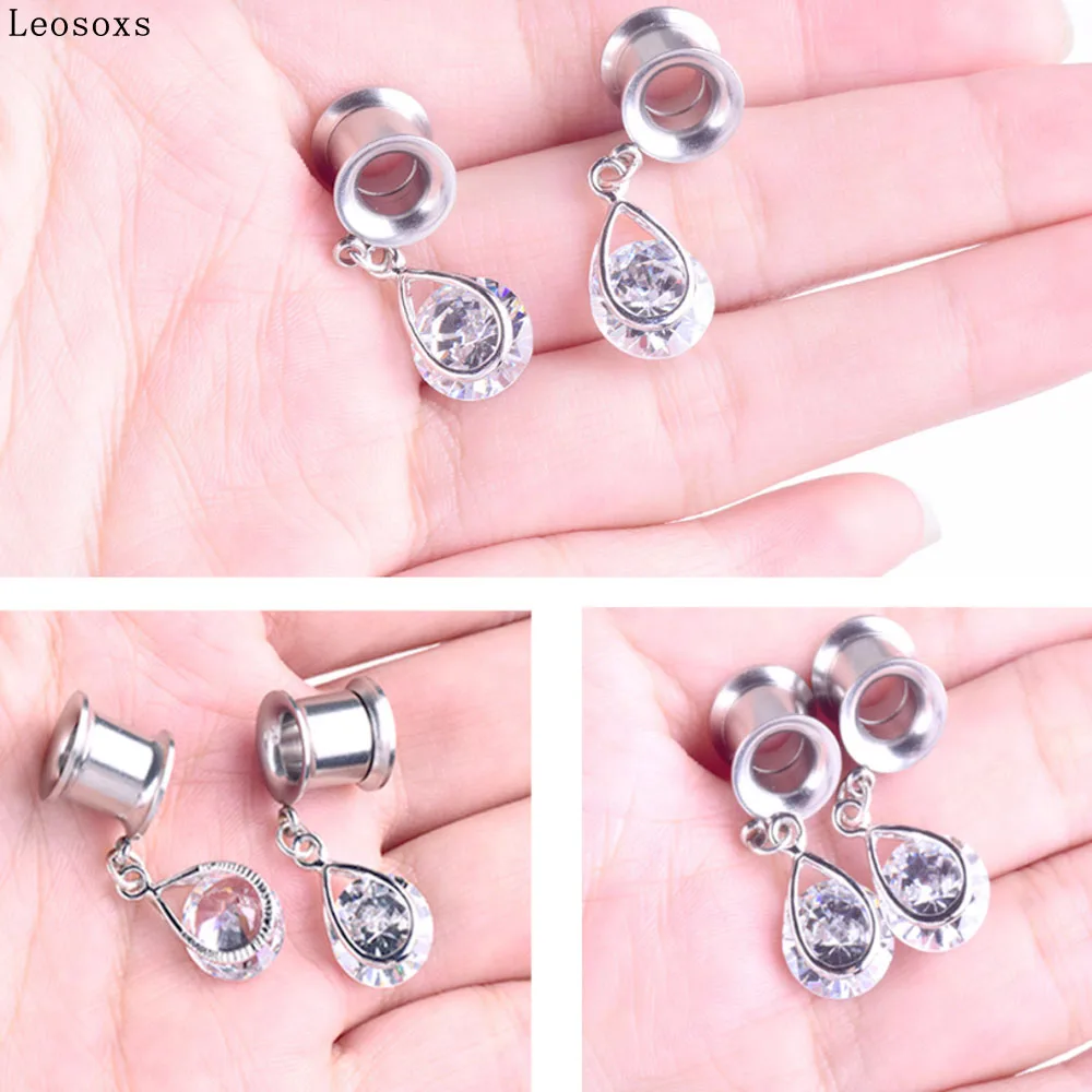 

Leosoxs 1 piece Explosion double horn drop pendant ear expansion ear profile popular puncture earrings plugs and tunnels