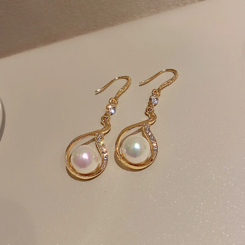 

Minar Korean Gold Colour Shinning Rhinestone Irregular Waterdrop Pendant Earrings for Women Imitation Pearl Earrings Oorbellen