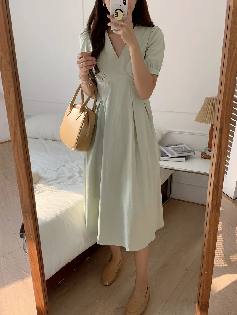 

Fashion new French temperament simple V-neck waist slim puff sleeve dress