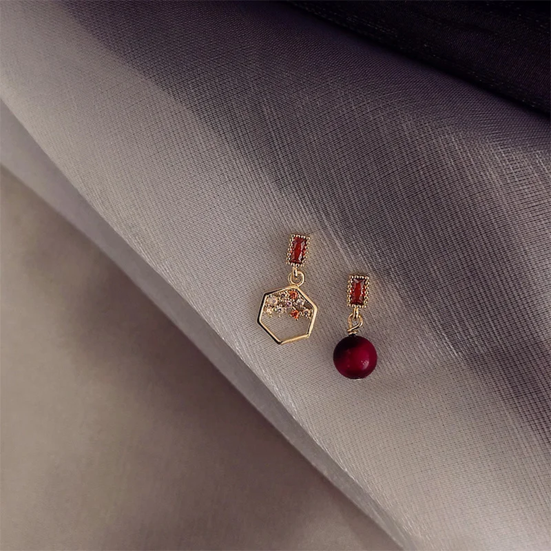 

AJC Woman pin one red bean asymmetrical small stud earrings micro set simple short earrings for ladies