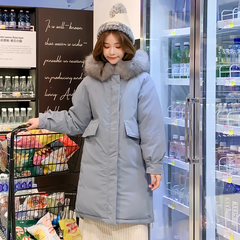 Женская длинная парка с капюшоном и меховым воротником теплая Осенняя верхняя