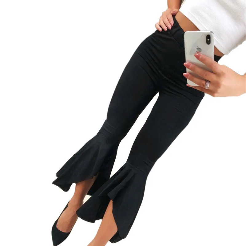 Брюки женские черные белые с оборками широкие подходят для повседневной носки |